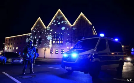 German President Urges Unity After "Dark Shadow" Of Christmas Market Attack
