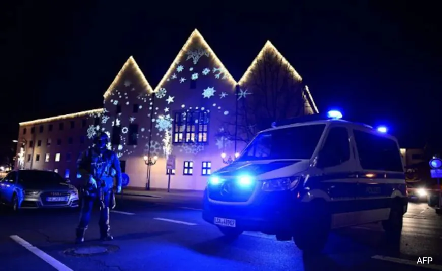 German President Urges Unity After "Dark Shadow" Of Christmas Market Attack